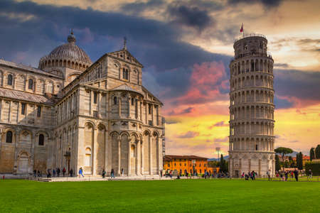 Cathedral and the Leaning Tower of Pisa at sunset, Italy biggest landmark.