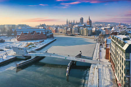 Beautiful scenery of Gdansk over Motlawa river at snowy winter, Polandの写真素材