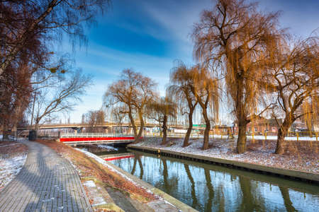 Pathway by the Radunia river in the winter park, Pruszcz Gdanski. Polandの写真素材