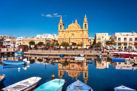 Sliema, Malta - January 10, 2020: Architecture of the harbor in Sliema city at sunrise, Malta.のeditorial素材