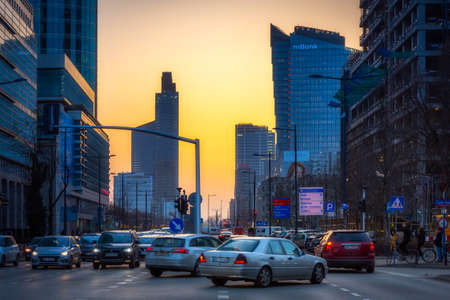 Warszawa, Poland - February 25, 2021: Beautiful architecture of Warszawa city center with modern skyscrapers at sunset, Poland.のeditorial素材