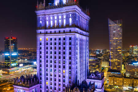 Warszawa, Poland - February 25, 2021: Beautiful architecture of Warszawa city center with the Palace of Culture and Science at night, Poland.のeditorial素材
