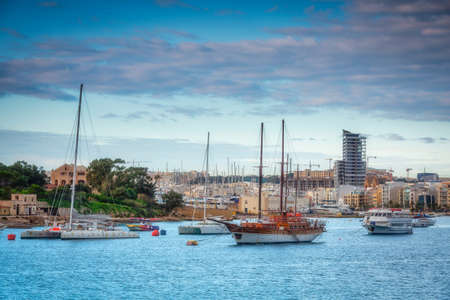 Beutiful coastline of Sliema city at sunrise, Malta.の写真素材
