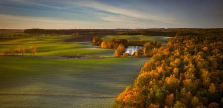 Autumnal landscape of Kashubian forests at sunrise. Polandの写真素材