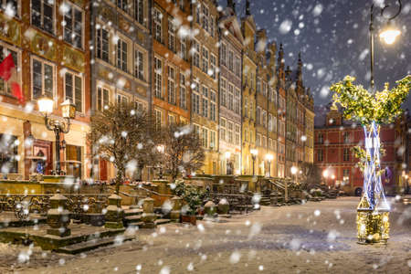 Beautiful Christmas decorations in the old town of Gdansk at snowy night. Polandの写真素材