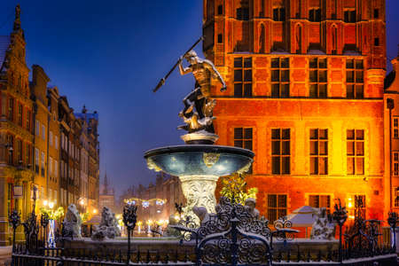 Neptune's Fountain in Gdansk at wintery night. Polandの写真素材