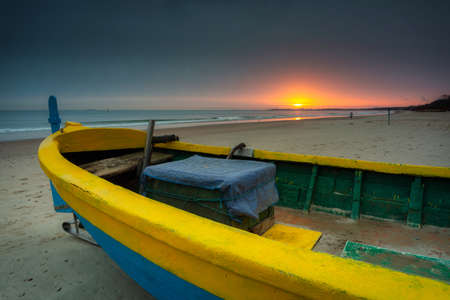 Fishing boat at sunrise on the Baltic Sea beach in Sopot. Polandの写真素材