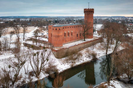Teutonic Castle at the Wda river in winter scenery. Swiecie, Poland.のeditorial素材