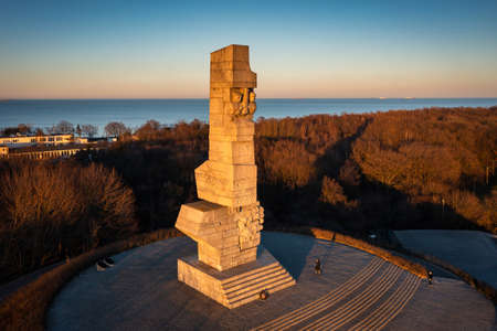 Gdansk, Poland - February 28, 2022: The Monument to the Defenders of the Coast on the Westereplatte Peninsula at sunset, Gdansk. Polandのeditorial素材