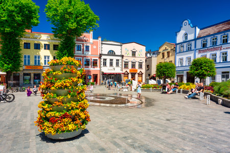 Puck, Poland - June 6, 2022: People on the market square of Puck  town at summer, Polandのeditorial素材