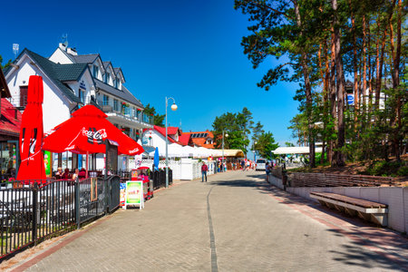 Sztutowo, Poland - Julne 23, 2022: The promenade to the beach in the seaside town of Sztutowo on the Baltic Sea, Polandのeditorial素材