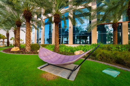 Abu DhabiI, UAE - March 27, 2014: Pool area of Khalidiya Palace by Rotana at sunrise in UAEのeditorial素材