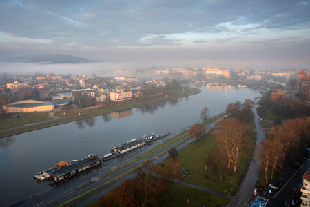 Foggy sunrise over the old town in Krakow. Polandのeditorial素材
