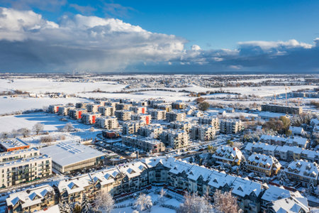 Aerial landscape of the road through snowy Rotmanka village at winter, Poland.の写真素材