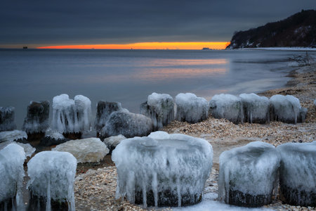 Frozen Baltic Sea beach in Babie DoÅy at sunset, Gdynia. Polandの写真素材