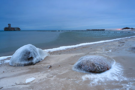 Frozen Baltic Sea beach in Babie DoÅy at sunset, Gdynia. Polandの写真素材