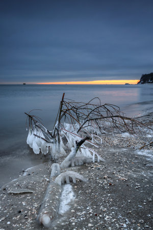 Frozen Baltic Sea beach in Babie DoÅy at sunset, Gdynia. Polandの写真素材