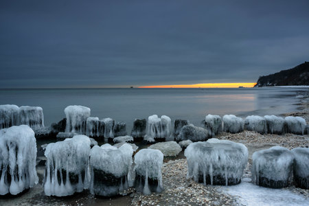 Frozen Baltic Sea beach in Babie DoÅy at sunset, Gdynia. Polandの写真素材