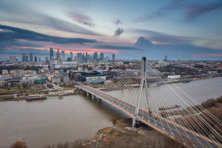 Modern cityscape of Warsaw at sunset, capital city of Poland.の写真素材