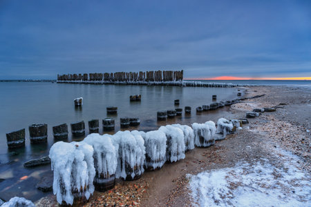 Frozen Baltic Sea beach in Babie DoÅy at sunset, Gdynia. Polandの写真素材