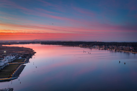 Beautiful sunset over the Vistula river at the Sobieszewo Island, Gdansk. Polandの写真素材