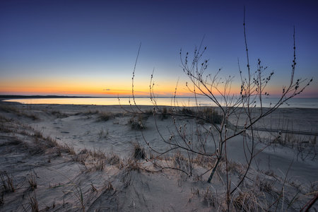 A beautiful sunset on the beach of the Sobieszewo Island at the Baltic Sea at spring. Polandの写真素材