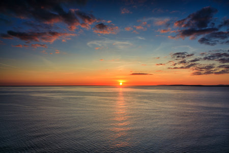 Beautiful sunset over the Atlantic Ocean in Irelandの写真素材
