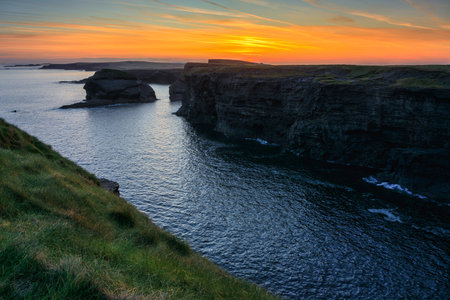 Kilkee Cliffs at Sunrise, Co. Clare, Irelandの写真素材