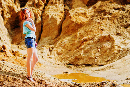 Beautiful young woman with red hair