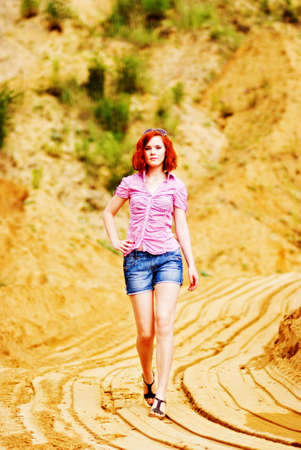 Beautiful young woman with red hairの写真素材