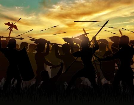 silhouettes fighting warriors are seen against the background of the rising sunの写真素材