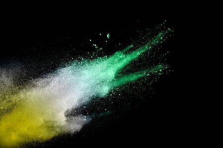 Color Holi powder splattered in Indian festival. Color powder explosion. Flag of India made with...