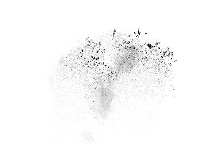 Black powder explosion on white background. Abstract black dust texture on white background.の写真素材