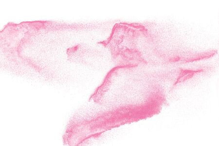 Pink colored sand splash against  whiteの写真素材