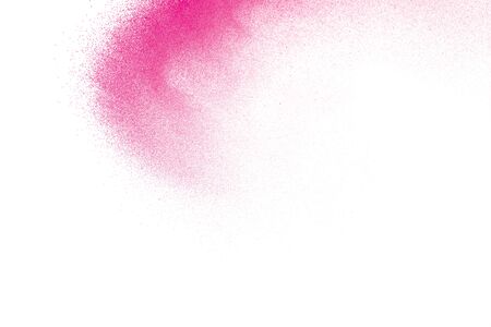 Pink dust particles splash on white background.Pink powder splash.