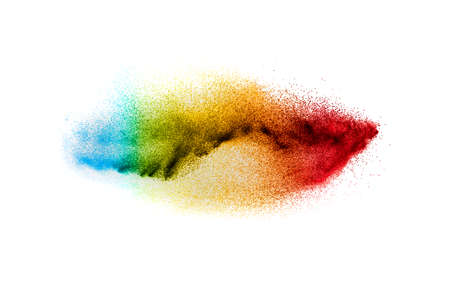 Multi colour powder explosion on white background. Launched colourful dust particles splashing.の写真素材