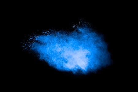 Blue color dust particles explosion cloud on black background.Color powder splash.
