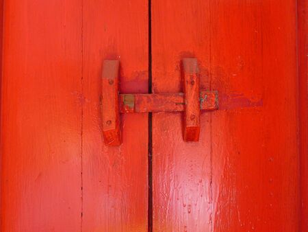 Old red wooden doorの写真素材