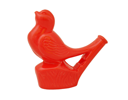 Red bird whistle / Isolated whiteの写真素材