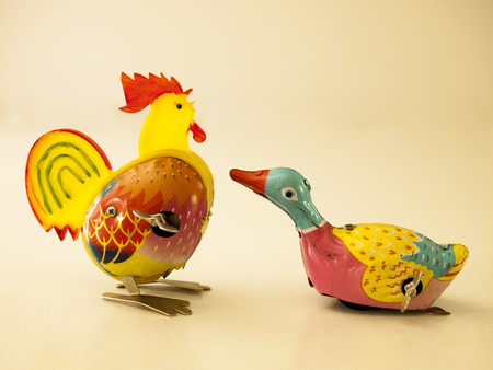 Duck and chicken tin toy / Isolated whiteの写真素材