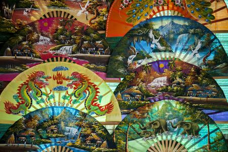 Hand fan painting / Asia Hand fan painting  : Colorful backgroundの写真素材