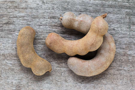 Tamarind on wood backgroundの写真素材