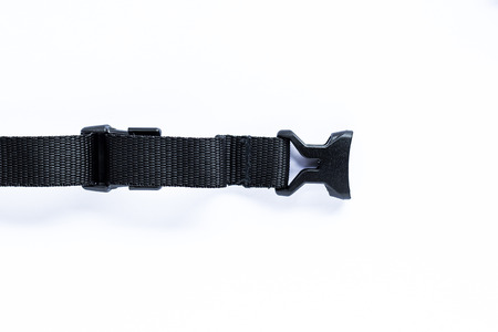 Locked black plastic on strap isolated on whiteの写真素材