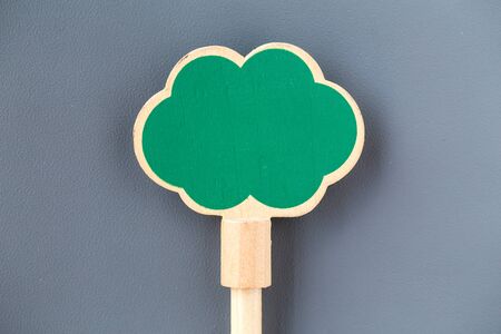 Wooden sign board on leather backgroundの写真素材