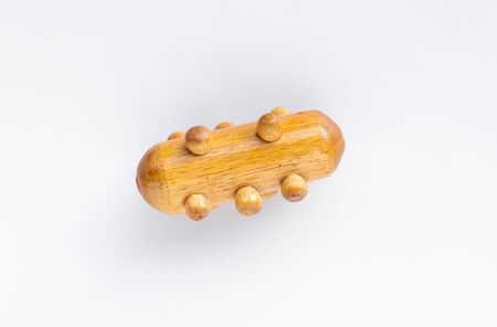wooden equipment massage for hand isolated on white backgroundの写真素材