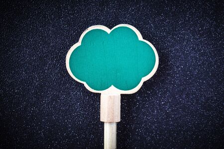 Wooden sign board on leather backgroundの写真素材