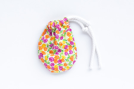 small bag pocket of hand made on write backgroundの写真素材