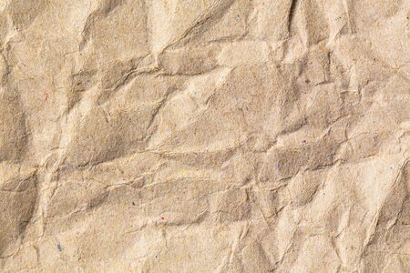 Wrinkled paper texture - Brown paper sheetの写真素材