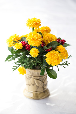 Colorful flower bouquet arrangement centerpiece in vase ceramic.の写真素材