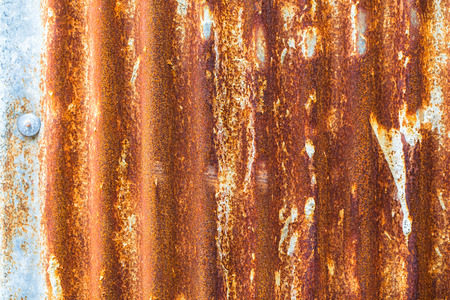 Rusted galvanized iron plateの写真素材